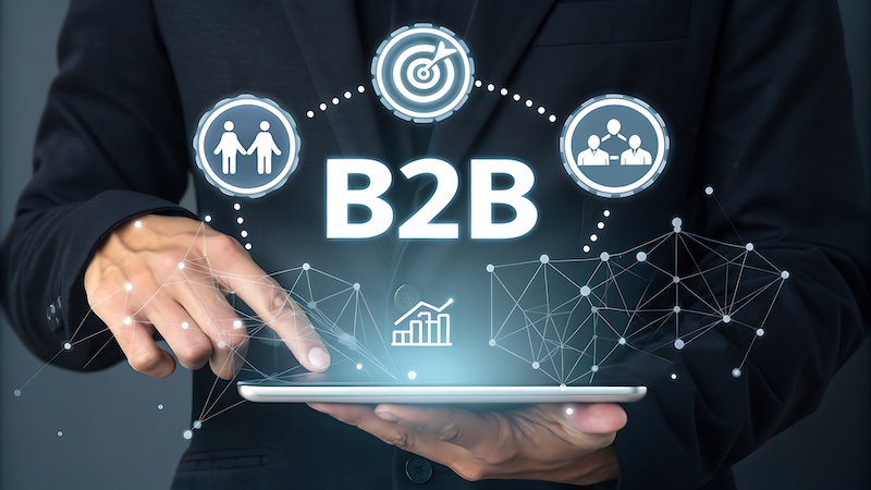 Intentsify Salutary Data Professional network growth: Businessman using technology for strategic partnerships and improved business to business relationships worldwide.